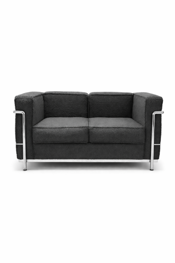 le corbusier sofa mit dunkel grauem teddy stoff bezogen